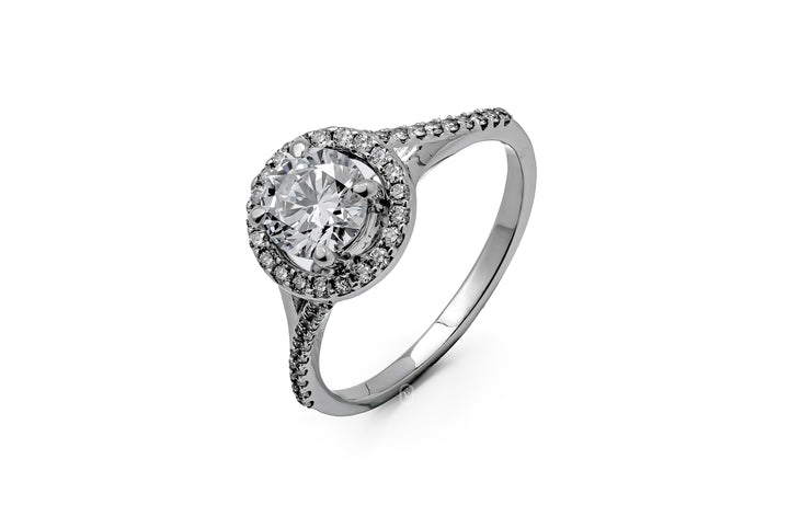 WHITEGOLD SPLIT SHANK HALO RING 0.8CT ROUND CUT WITH SIDE STONE LAB DIAMOND